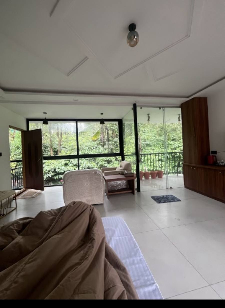 Sitting area with sliding glass to the balcony